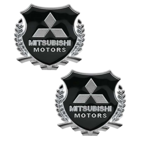 Шильдик Mitsubishi Motors черный металл 55*50мм 2шт SHK K208 фото 1